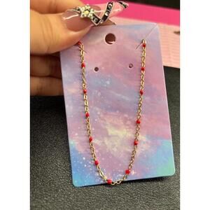 Necklace with red beads